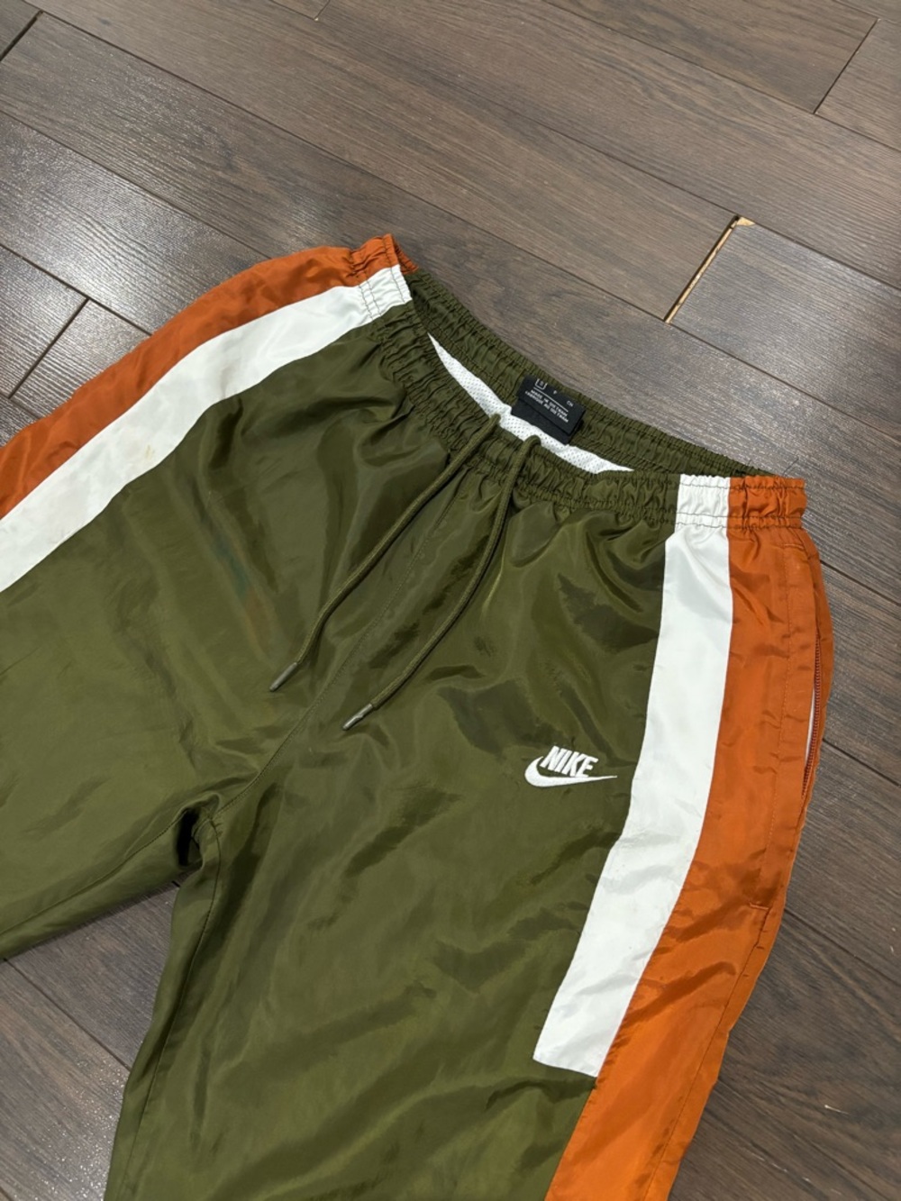 Nike Olive Green Track Pants with Orange & White Side Panels